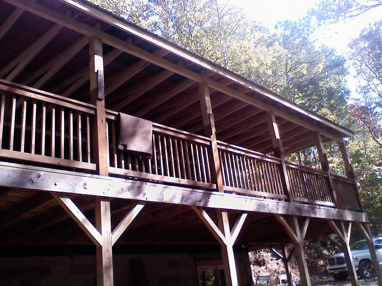 Timber framing under a new elevated porch and deck — Roof Leak Repair in Eastman by Roofing Brothers